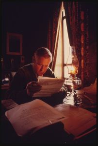 Oregon Governor Tom Mccall Used a Kerosene Lamp in His Office to Read Mail as a Method to Get the Public's Attention Regarding the Seriousness of the Energy Crisis in the Pacific Northwest 11/1973